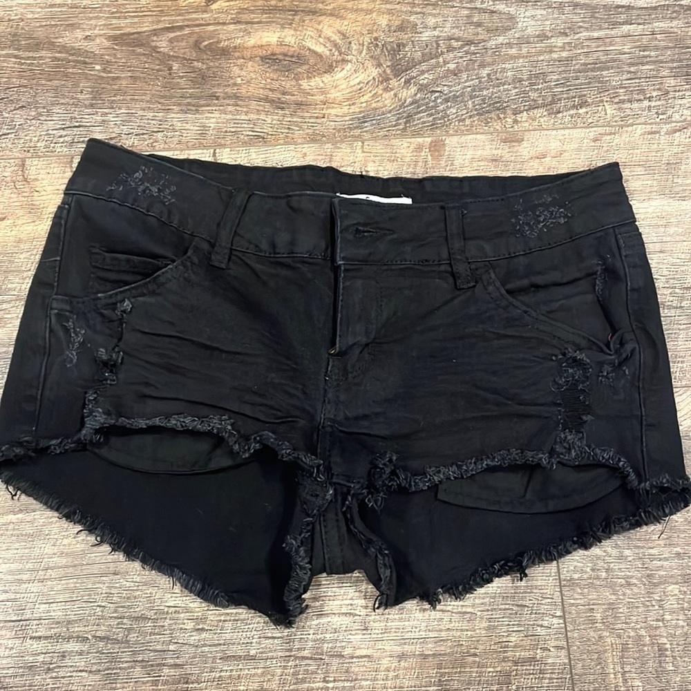 Jean shorts: black. Size: 4. Distressed look.